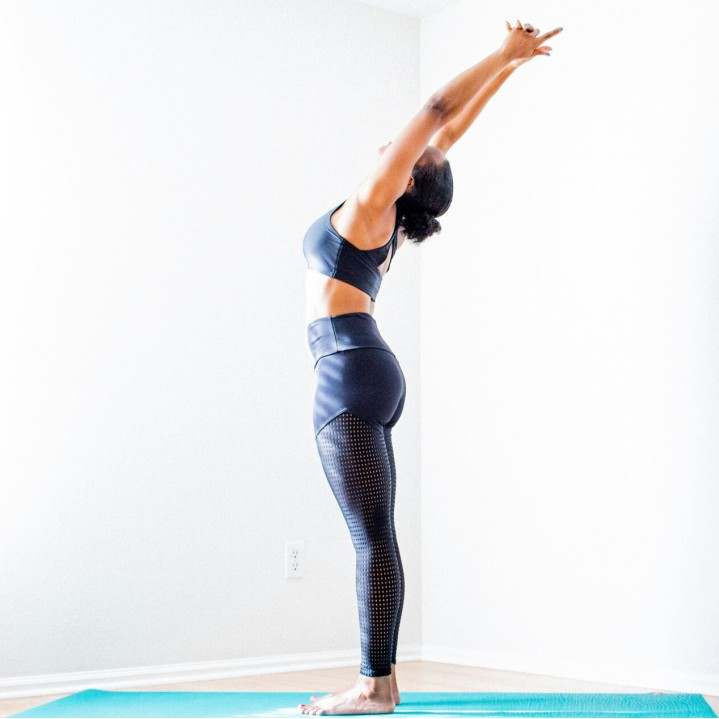 Students flowing through Vinyasa sequence
